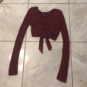 Long sleeve. Knit material. Crop top sweater